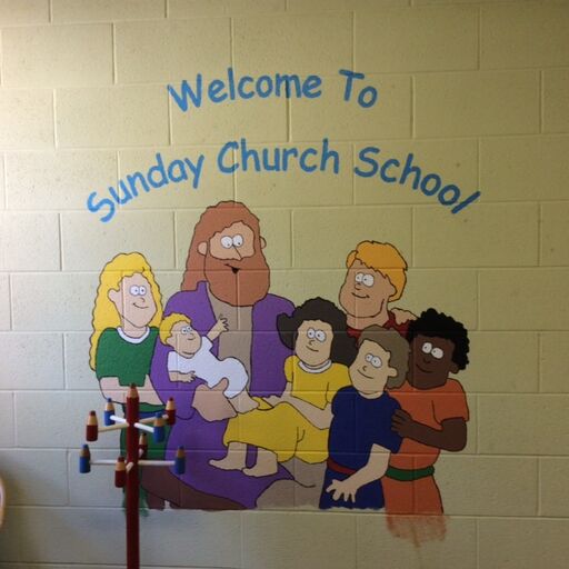 Mural on a wall saying welcome to Sunday Church School